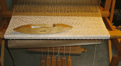 Abra Palumbo weaving