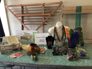 Summer 2022 classes--projects on display, including triangle weaving