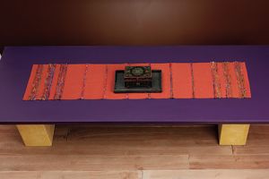 Festive Dresser Scarf by Betsy Blumenthal uses Recycled Silk Yarn; photo credit Long Thread Media